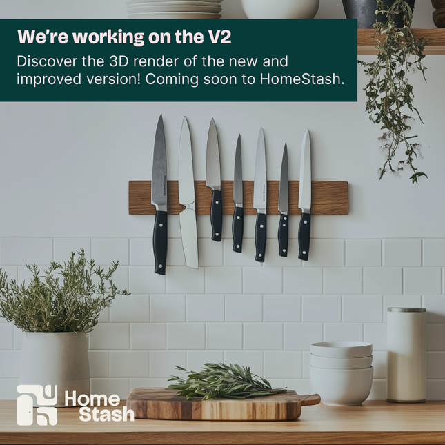 Wooden magnetic knife holder mounted on a kitchen wall, holding an assortment of knives with black handles. The setting includes a wooden countertop with a cutting board and fresh rosemary, alongside white bowls and a potted herb plant. White subway tiles and floating wooden shelves complete the minimal, modern kitchen look.